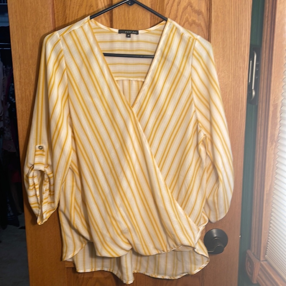 White and yellow striped blouse. Size Medium.